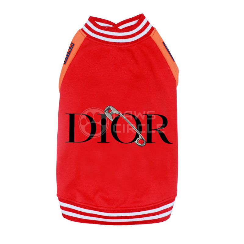 Red pet outfit with 'Dior' logo and safety pin design on a white background