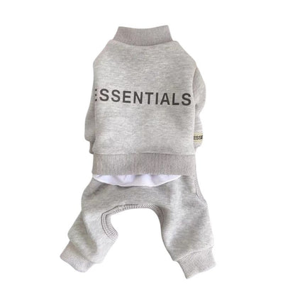 Gray dog outfit with 'ESSENTIALS' text on a white background