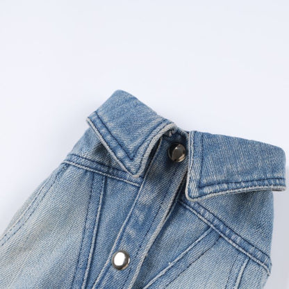 Close-up of a blue denim jacket on a white background