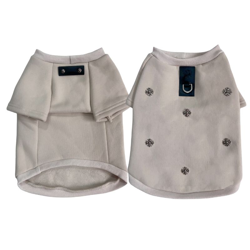 Two beige chrome hearts dog sweaters with decorative buttons on a white background