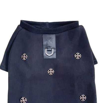 Black chrome hearts dog sweater with decorative metal studs on a white background