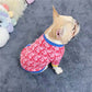 Christian Dior Monogram dog sweater in neon pink colour