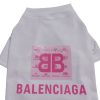 White pet shirt with pink Balenciaga logo on a white background