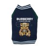 Navy blue Burberry dog jacket with teddy bear design on a white background