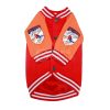 Red and orange dog jacket with ski design on a white background