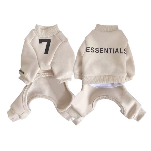 Two beige dog outfits with numbers and text on a white background