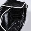 Black leather product with 'Paws Circle' logo on a white background
