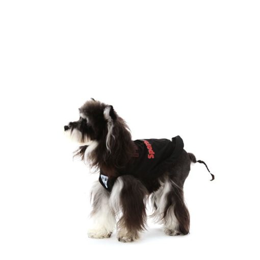 Dog wearing a black hoodie with red text on a white background