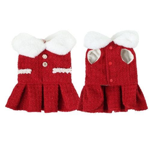 Red knitted dog dress with white trim on a white background