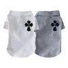 Two CHROME HEARTS POLO TEE FOR DOGS, one white and one gray, with black cross designs on a white background.