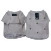 Two gray dog chrome heart sweaters with decorative cross on a white background
