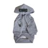 Gray dog hoodie with a brand label on a white background