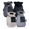 Four dog coats in gray, black, and white with decorative patches on a white background