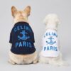 Back view of black and white Pawline Anchor dog t-shirts