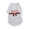White Pupchi Ribbon dog t-shirt with red and green bow graphic