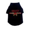 Black Pupchi Ribbon dog t-shirt with red and green bow graphic