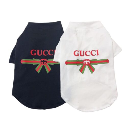 Black and white Pupchi Ribbon dog t-shirts with red and green bow graphic