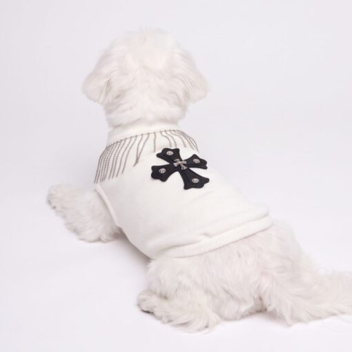 Dog model wearing the Paws Circle Fringed Cross Dog Sweatshirt